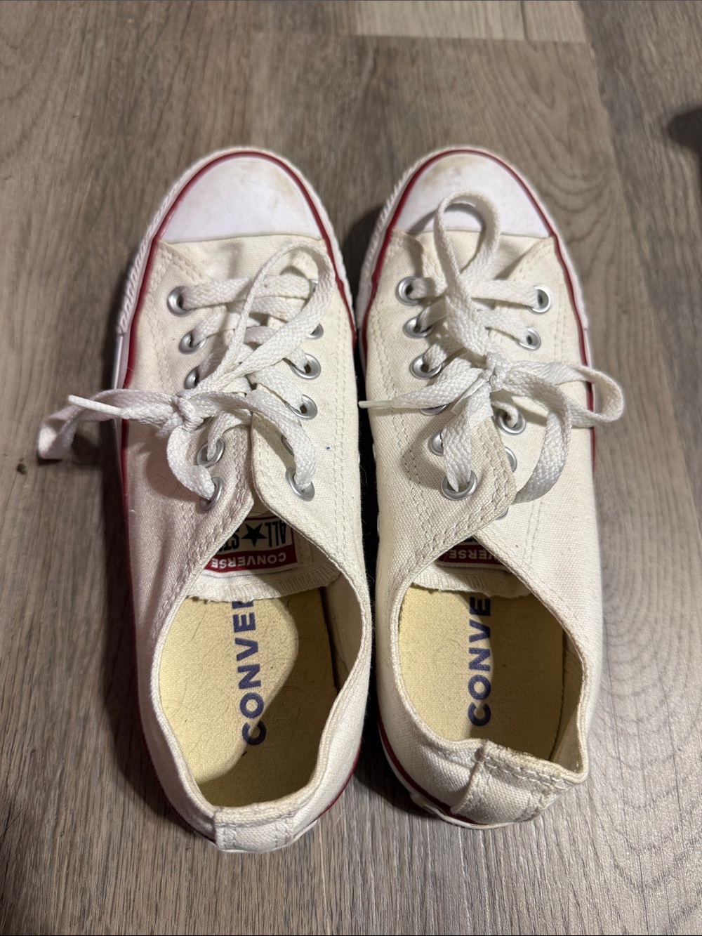 Converse women’s Low Top Canvas Sneakers in Cream with Red Trim